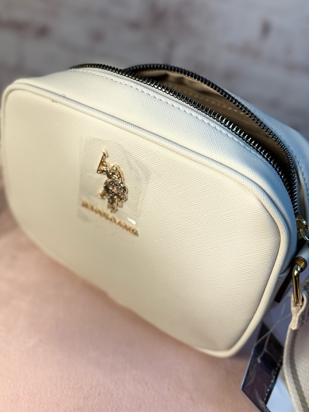 U.S. Polo Assn. Cream Saffiano Crossbody Bag with Wide Strap - Picture 15 of 16